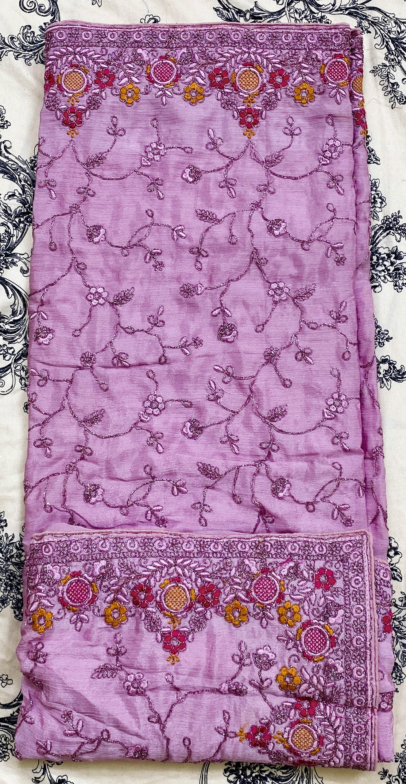 Indian Saree crafted with fine net material and floral embroidery